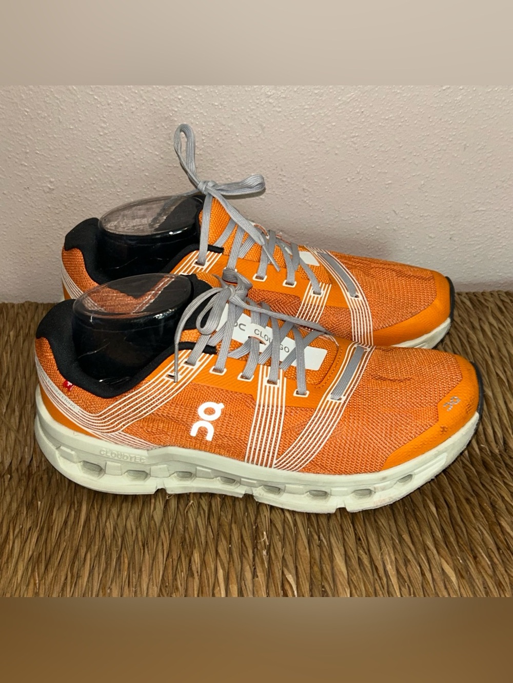 On Running Men’s Orange Mesh Cloudtec Running Shoes with Gray Accents